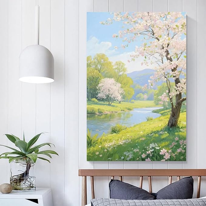 The scenery of a stream between trees and cherry blossoms under the blue sky is suitable for posting in the living room bedroom office landscape posters